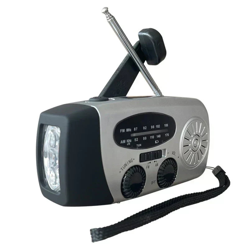 ⏳ Tijdelijke aanbieding⏳ 🚨📻 50% KORTING! Nooit meer zonder stroom, licht of weerwaarschuwingen bij een storm – deze draagbare noodradio op zonne-energie is radio, powerbank én zaklamp in één. Handzwengel, USB & zonne-energie!