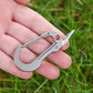 Multifunctionele titanium sleutelhanger-karabijnhaak met zakmes