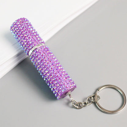 Parfum spray fles met strass steentjes en sleutelhanger