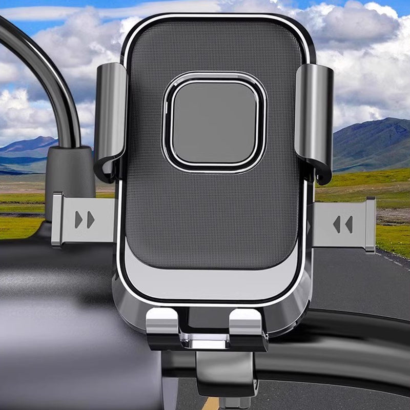 🔇📱 50% KORTING! Stop met het slopen van je cameralens door stuurschokken! Deze houder absorbeert élke trilling, of je nou over klinkers klapt of een bospad scheurt. Je telefoon blijft stilstaan, jij blijft navigeren!