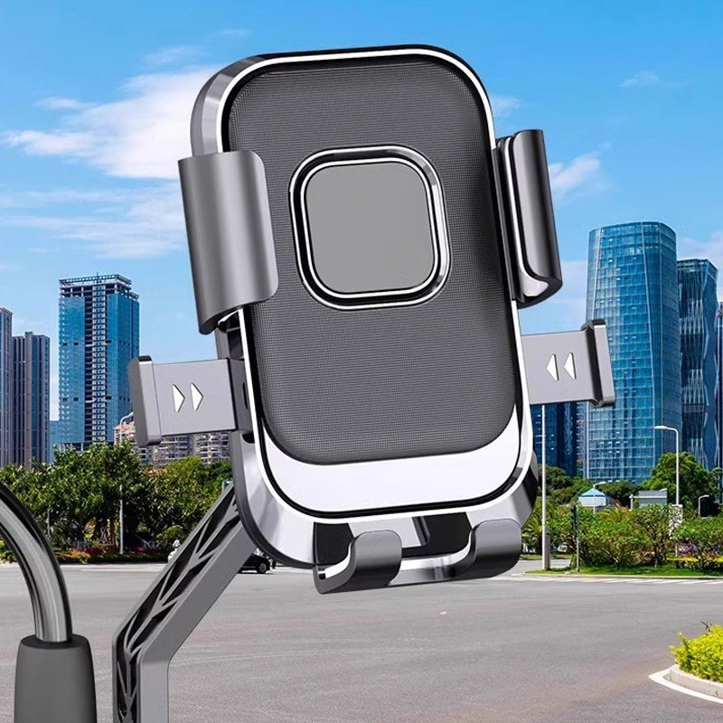 🔇📱 50% KORTING! Stop met het slopen van je cameralens door stuurschokken! Deze houder absorbeert élke trilling, of je nou over klinkers klapt of een bospad scheurt. Je telefoon blijft stilstaan, jij blijft navigeren!