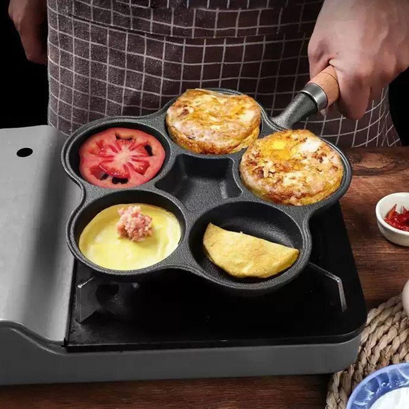 🍳 NU 50% KORTING! 🔥 Gietijzeren koekenpan voor eieren (4 kopjes) - Antiaanbaklaag en gelijkmatige verhitting, perfect voor ontbijtsandwiches of pannenkoeken 🥪✨