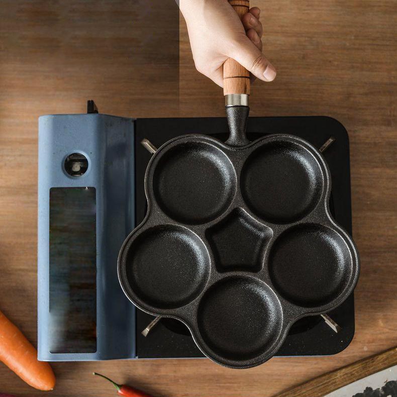 🍳 NU 50% KORTING! 🔥 Gietijzeren koekenpan voor eieren (4 kopjes) - Antiaanbaklaag en gelijkmatige verhitting, perfect voor ontbijtsandwiches of pannenkoeken 🥪✨